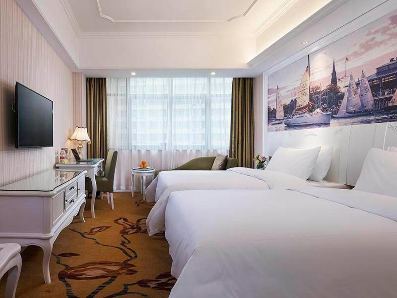 Vienna International Hotel Fenghua Zhongshan Road Екстер'єр фото