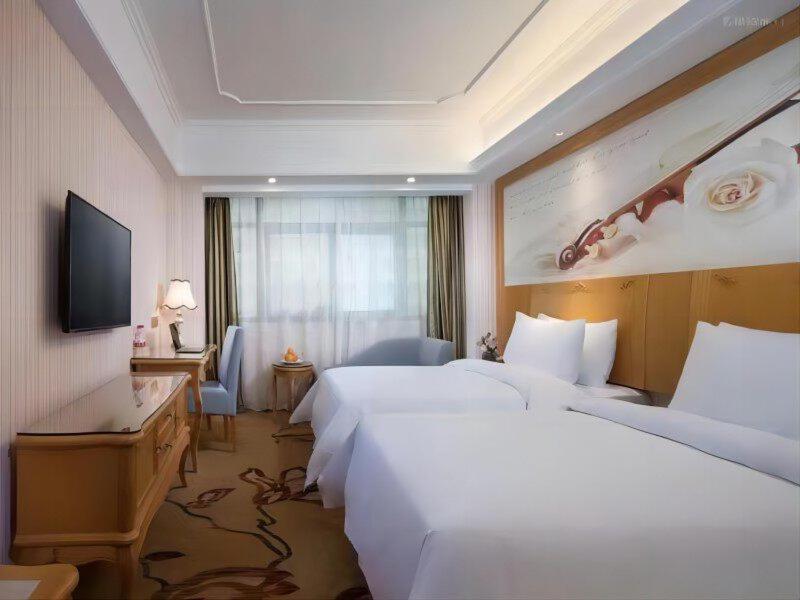 Vienna International Hotel Fenghua Zhongshan Road Екстер'єр фото