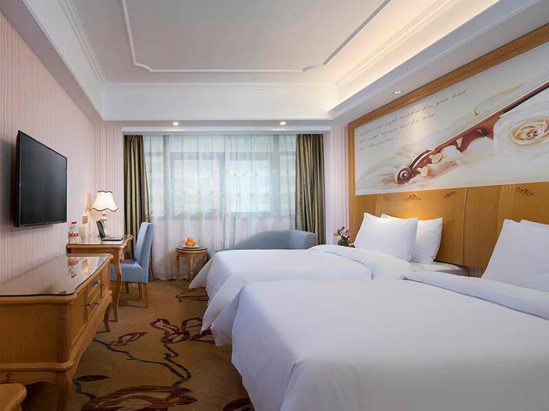 Vienna International Hotel Fenghua Zhongshan Road Екстер'єр фото