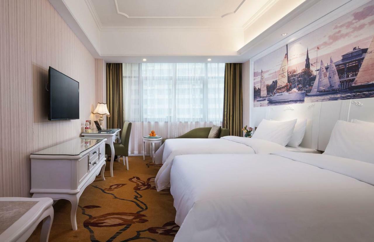 Vienna International Hotel Fenghua Zhongshan Road Екстер'єр фото