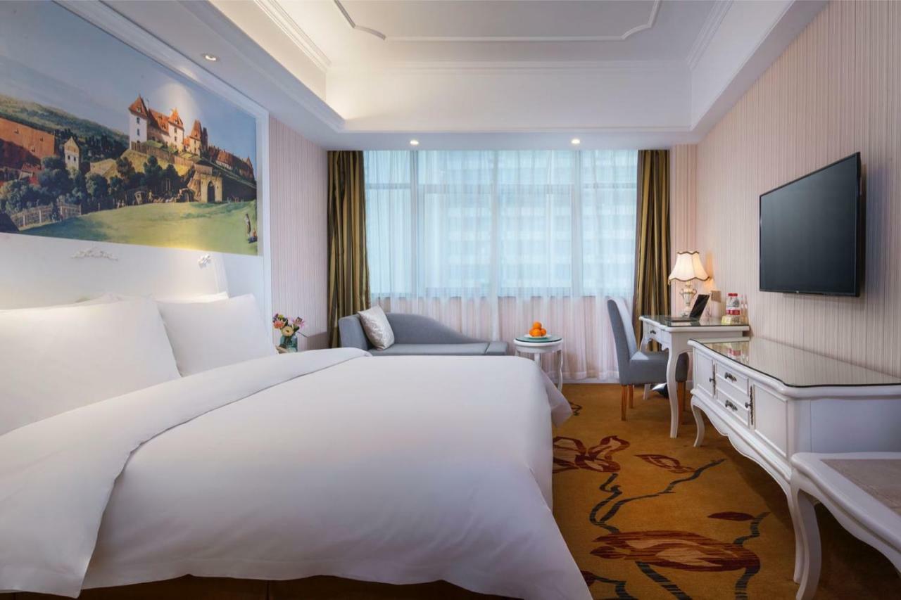 Vienna International Hotel Fenghua Zhongshan Road Екстер'єр фото