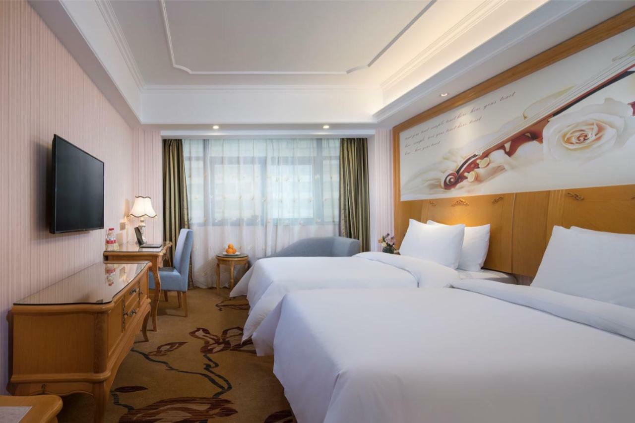 Vienna International Hotel Fenghua Zhongshan Road Екстер'єр фото